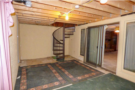 Photo of the interior of the Fager home basement, where the murders of the 2 girls took place